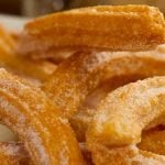 Churros with cinnamon sugar and orange chocolate sauce