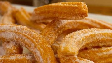 Churros with cinnamon sugar and orange chocolate sauce