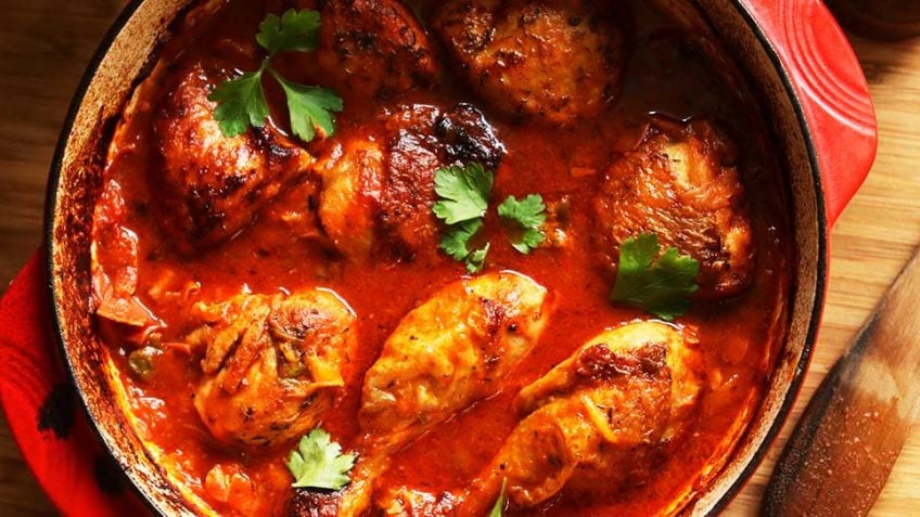 Chicken Roman style with bell peppers and tomato