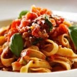 Fresh tomato and basil with freshly made fettuccine pasta