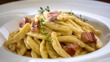 Capunti in cream pecorino cheese and pancetta sauce