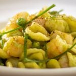 Orecchiette with shrimp and peas in a creamy sauce