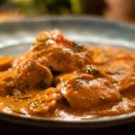 Chicken thighs in roasted bell pepper cream sauce