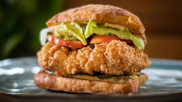 There are a lot of “Best fried chicken recipes out there”, many try to imitate the famous KFC secret recipe. This Italian twisted recipe is my secret and it’s so, so delish, and I’m sharing it with you! You simply cannot beat the freshness of homemade fried chicken. This is quite simple to make and despite its simplicity in ingredients. It’s spicy, crispy and juicy. I’ll be bold enough to claim that it’s the best recipe you will ever find. With the smokiness of the paprika, the spicy popcorn like crunchy coating and the brined moist meat, you will be amazed at the outcome using a standard fryer. I’ve made this using boneless, skinless chicken thighs but you can certainly make it with chicken breast, ideally skin on. The ciabatta bread is toasted in olive oil, coated with garlic mayonnaise, that alone is incredible! Serve this fried chicken with a salad, a few fries on the side and a nice glass of wine! No coke! Make it quick before this becomes the next secret fried chicken recipe!
