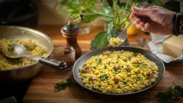A simple risotto made with Italian sausage, peas and saffron spice. A good risotto should be creamy without cream and cooked al dente like pasta. Nothing worse than a gluggy risotto. It should also be a little runny once served, and not in clumps. This recipe uses freshly made chicken stock; this step is optional but recommended as your risotto is only as good as your stock. I never buy stocks and I always buy whole chickens. The chicken carcass and bones make the most delicious stock and it’s healthy. Bought stocks are full of preservatives, salt and flavour enhancers, some don’t even have chicken! There may be some good ones you can buy but I haven’t seen them yet. Risotto is traditionally a Northern Italian dish, it’s made using a high starch rice such as Arborio or Carnaroli and other rounded short grain rice. Arborio seems to be the most popular, although a lot of Chefs will favour Carnaroli as it’s less likely to get overcooked and retains the al dente texture. For this recipe I used Carnaroli, which works very well and absorbs the liquid easier. The key is to not over cook it, just like a good pasta you want that firm bite and not a soft mash that can result in being gluey. I used Italian sausages which usually contain fennel, this gives the meat pieces a beautiful flavour. The flavour also infuses into the rice. Buy the good cheese and throw in a little or a lot of butter, either way you can’t go wrong. Always serve it immediately but if you can’t, reheat it in a pan with a little water. I like to also drizzle a little olive oil on top before serving. Enjoy risotto with sausage and peas