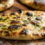 Simple Garlic naan cooked in a cast iron skillet