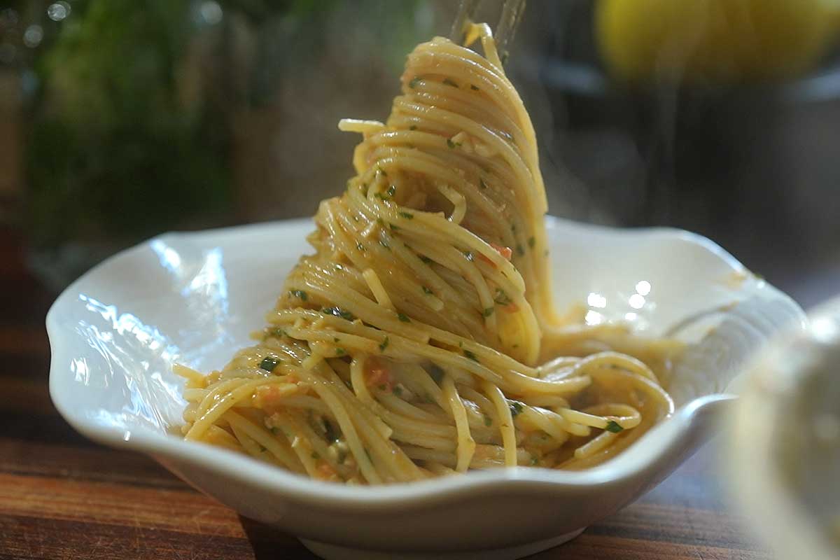 Final hero style shot of a single plate twirled with spaghetti