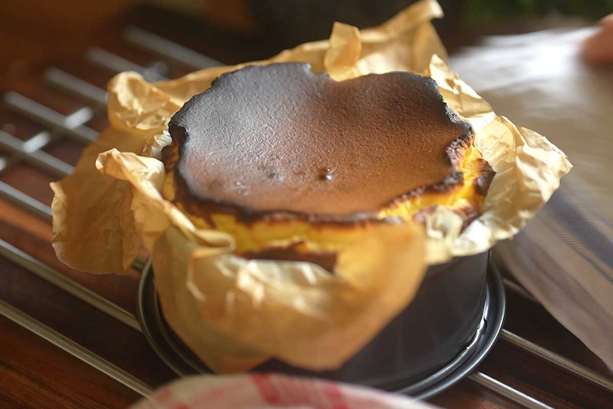 The cheesecake fresh out of the oven, still wobbling in the centre