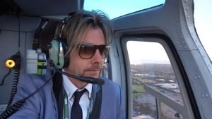 Joel Mielle in helicopter