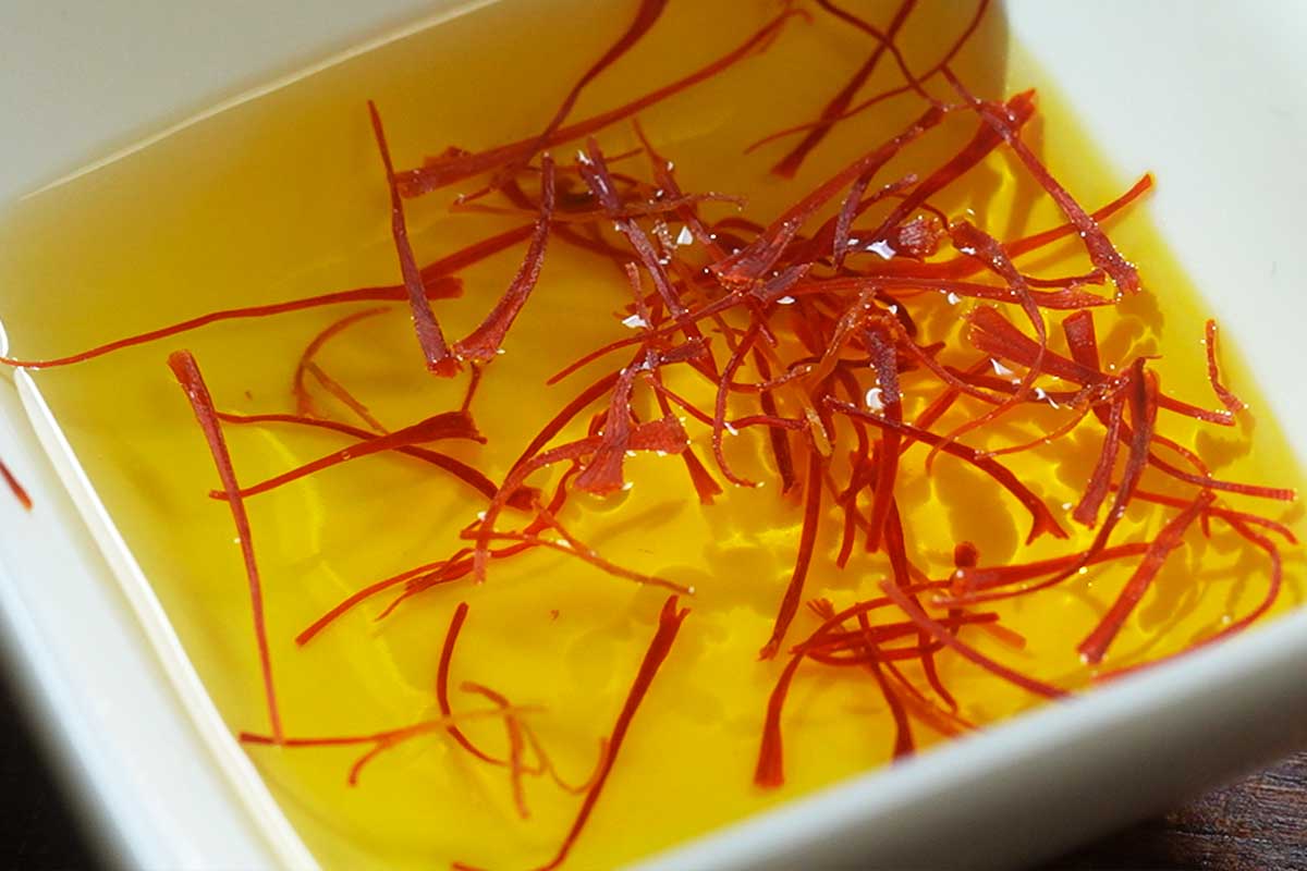 Saffron threads soaking in water