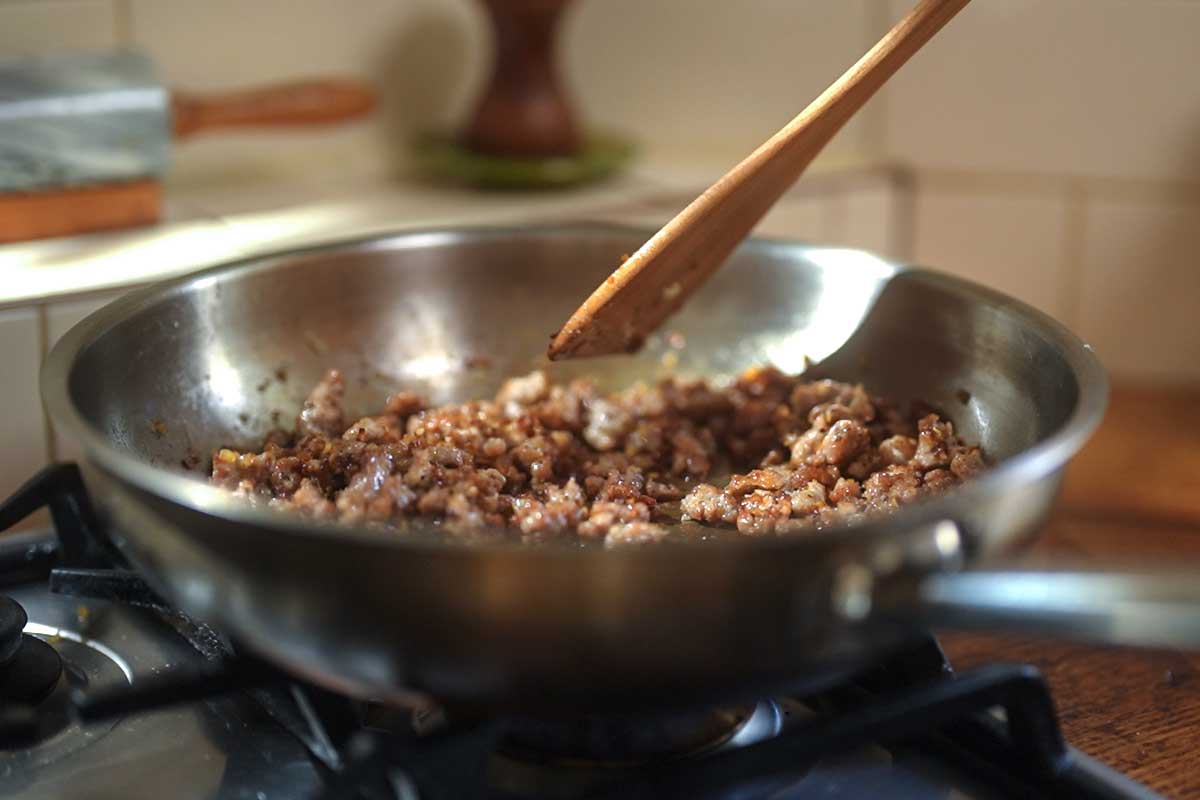 Juicy Italian sausage browning