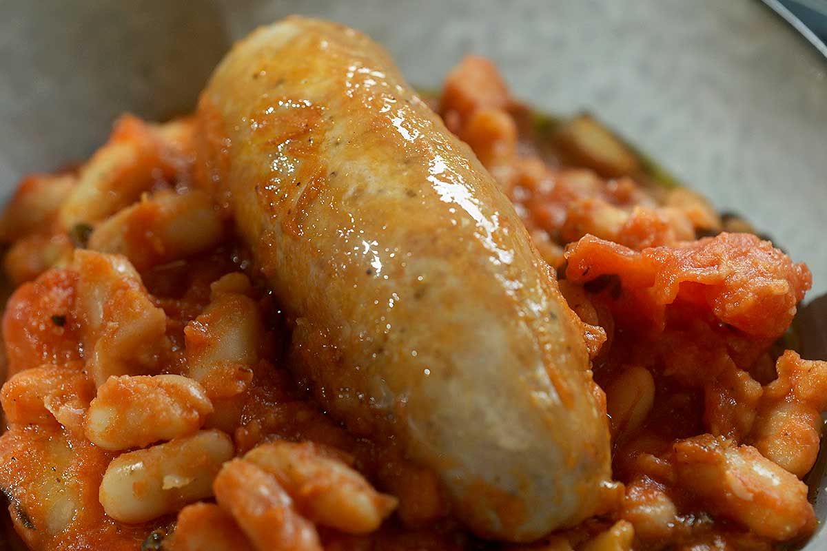 creamy cannellini beans coated in sage garlic tomato sauce